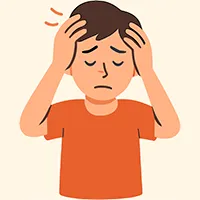頭を抱える様子